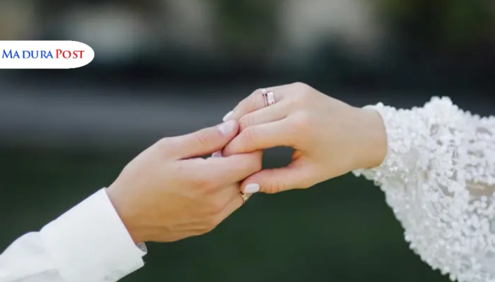 ILUSTRASI. Potret pasangan pengantin yang tengah bertukar cincin sebagai simbol ikatan pernikahan. (Istimewa for MaduraPost)