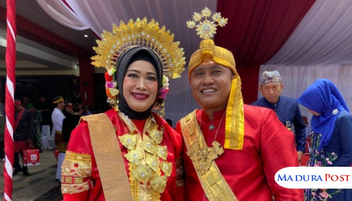 SERASI. Kepala Bapenda Sumenep, Faruk Hanafi, bersama istri, menghadiri upacara bendera peringatan HUT ke-80 RI di halaman Kantor Bupati. (Istimewa for MaduraPost)