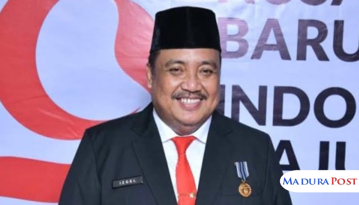 PROFIL. Potret Kepala Bakesbangpol Sumenep, Ach. Dzulkarnain, salam perayaan HUT RI. (Istimewa for MaduraPost)